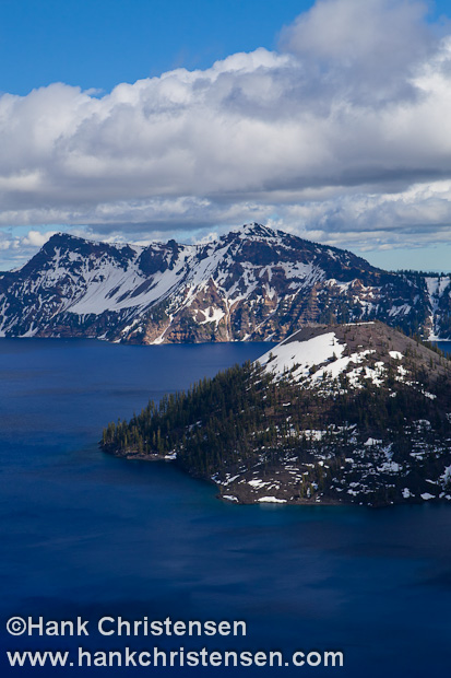 The cinder cone of Wizard Island sits just off the rim of Crater Lake