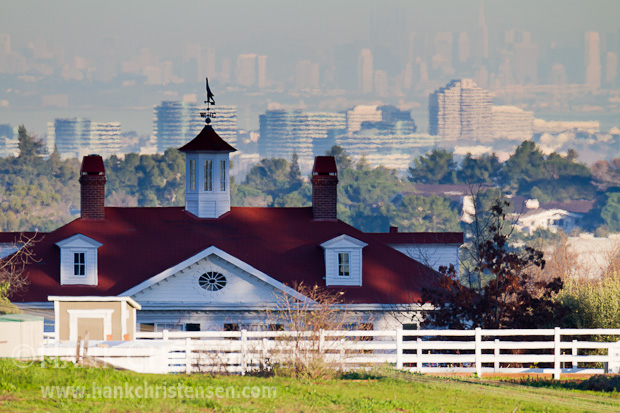 Three City View (click for larger image) A view of a Palo Alto home includes the city of San Mateo in the midground and San Francisco in the background. The view is compressed using a long telephoto lens.