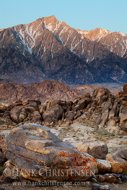 Various patterns and colors of rock form layers to the face of Mt. Langley, Alabama Hills, CA