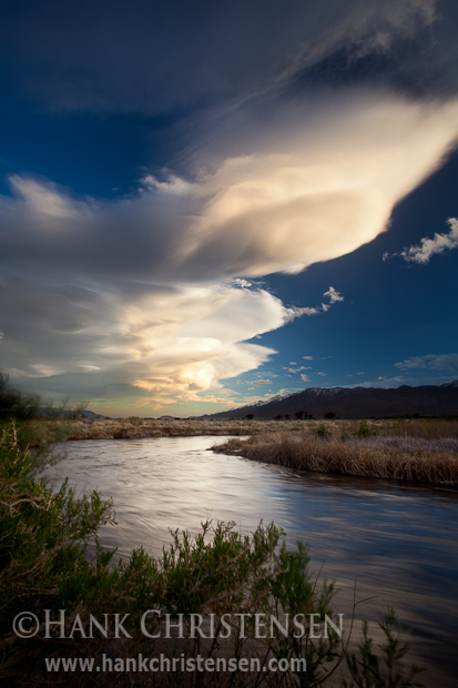 Lenticular clouds form over Owen's Valley at sunset, Bishop, CA