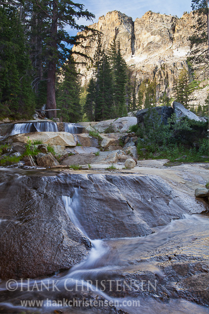 A stream cascades down slabs of granite below an unnamed peak, Ten Lakes, Yosemite National Park