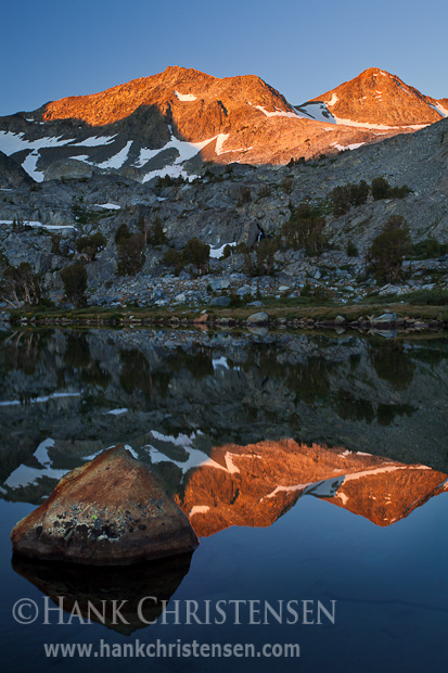 The morning sun touches the peaks surrounding Davis Lake, Ansel Adams Wilderness