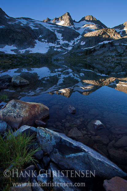 Mt. Davis is reflected in the still morning waters of Davis Lake, Ansel Adams Wilderness