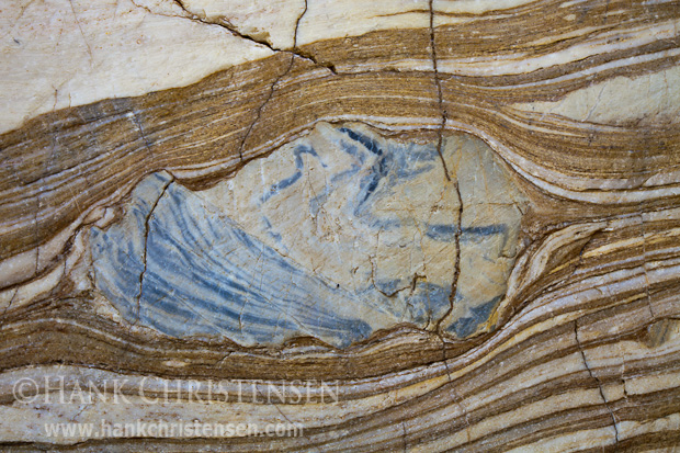 Petrified sandstone forms in layers of design along the walls of Mosaic Canyon, Death Valley National Park