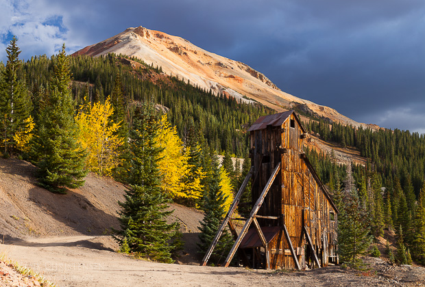 Silver ore was carted out by 75 mules every day. Here the old mine is front lit with dramatic dark skies beyond.