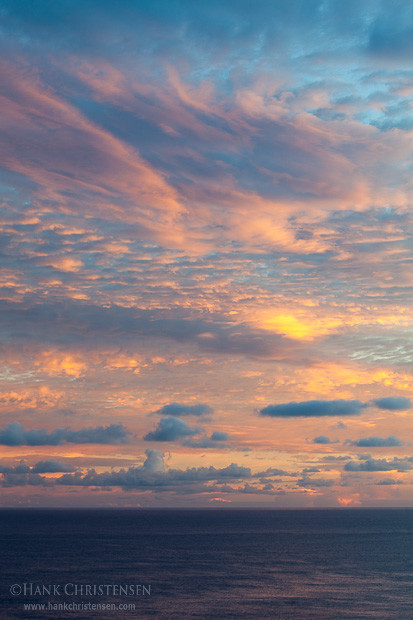 Pastels color the northern sky at sunrise, Kauai, Hawaii