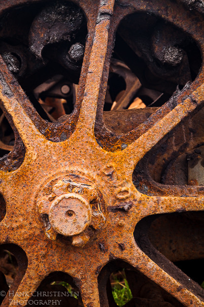 Ancient logging machinery rusts in the damp weather of Charleston Oregon