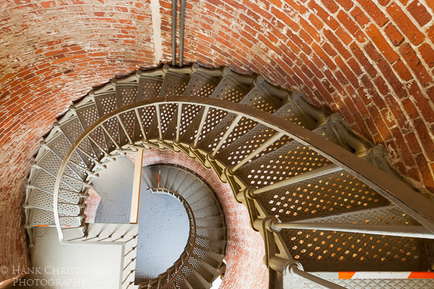 The stairway up the lighthouse tower circles within a brick structure