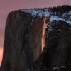 For only a few days a year, the setting sun lights up the seasonal horsetail falls, cascading down the sheer face of El Capitan in Yosemite National Park.