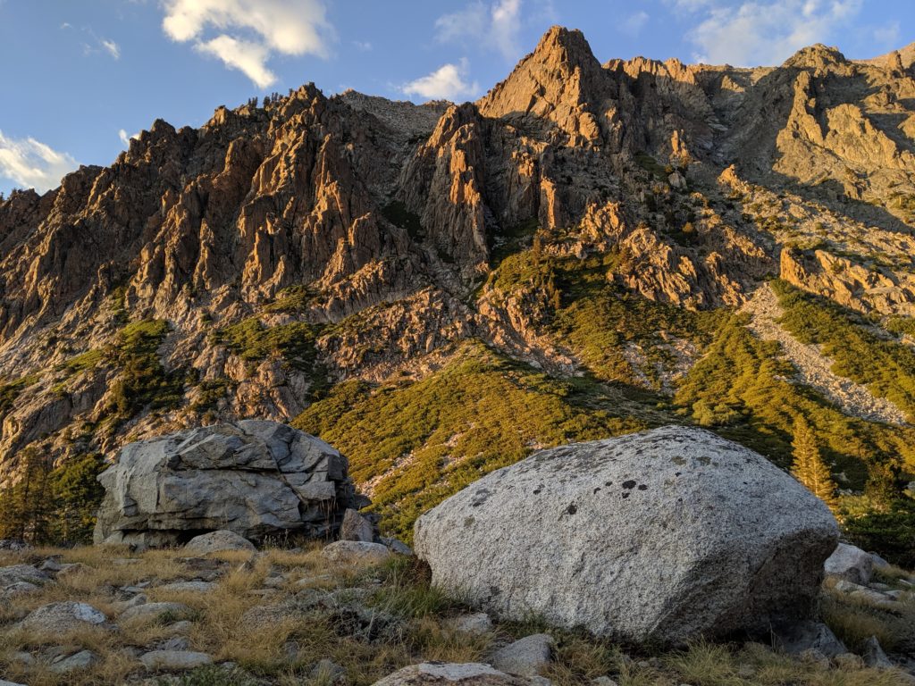 Two boulders stand sentinel over a valley catching the last rays of daylight, Sequoia National Park